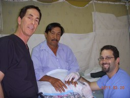 Dr Fields With A Student Doc And A Patient